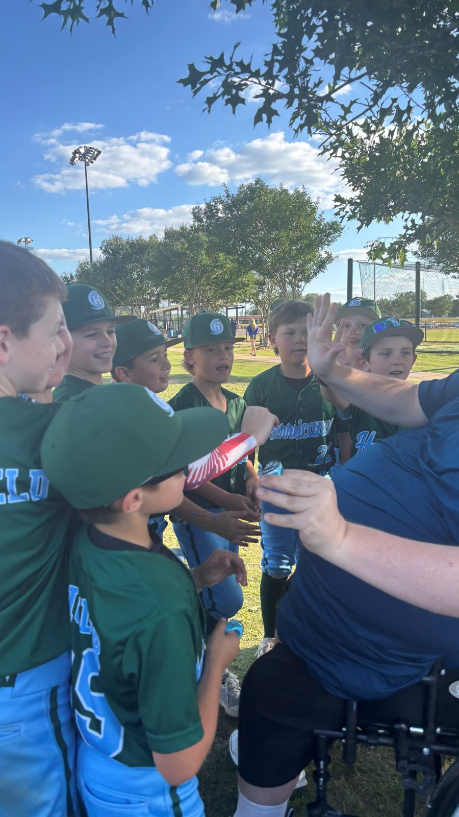 Hurricanes players gathered around Patrick
