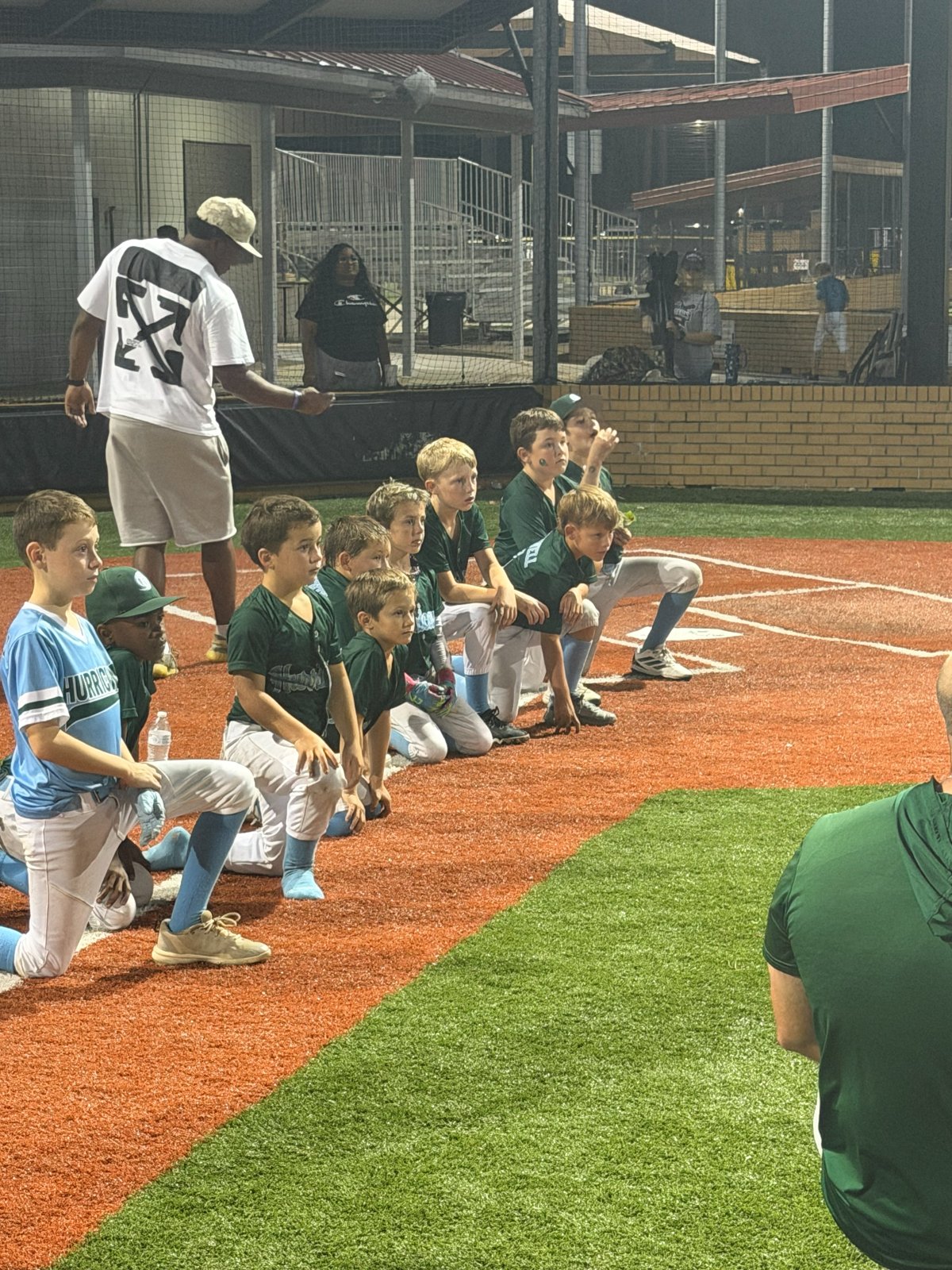 Players lined up in the dugout